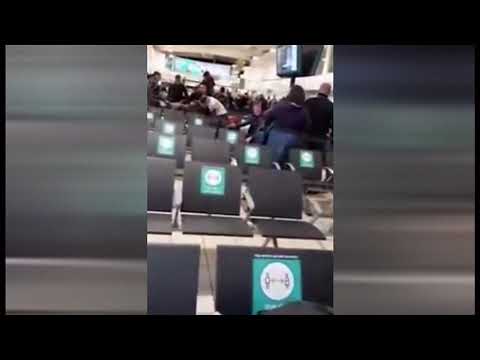 Eleven charged after fight breaks out at Luton Airport (UK) - BBC London News - 15th May 2021