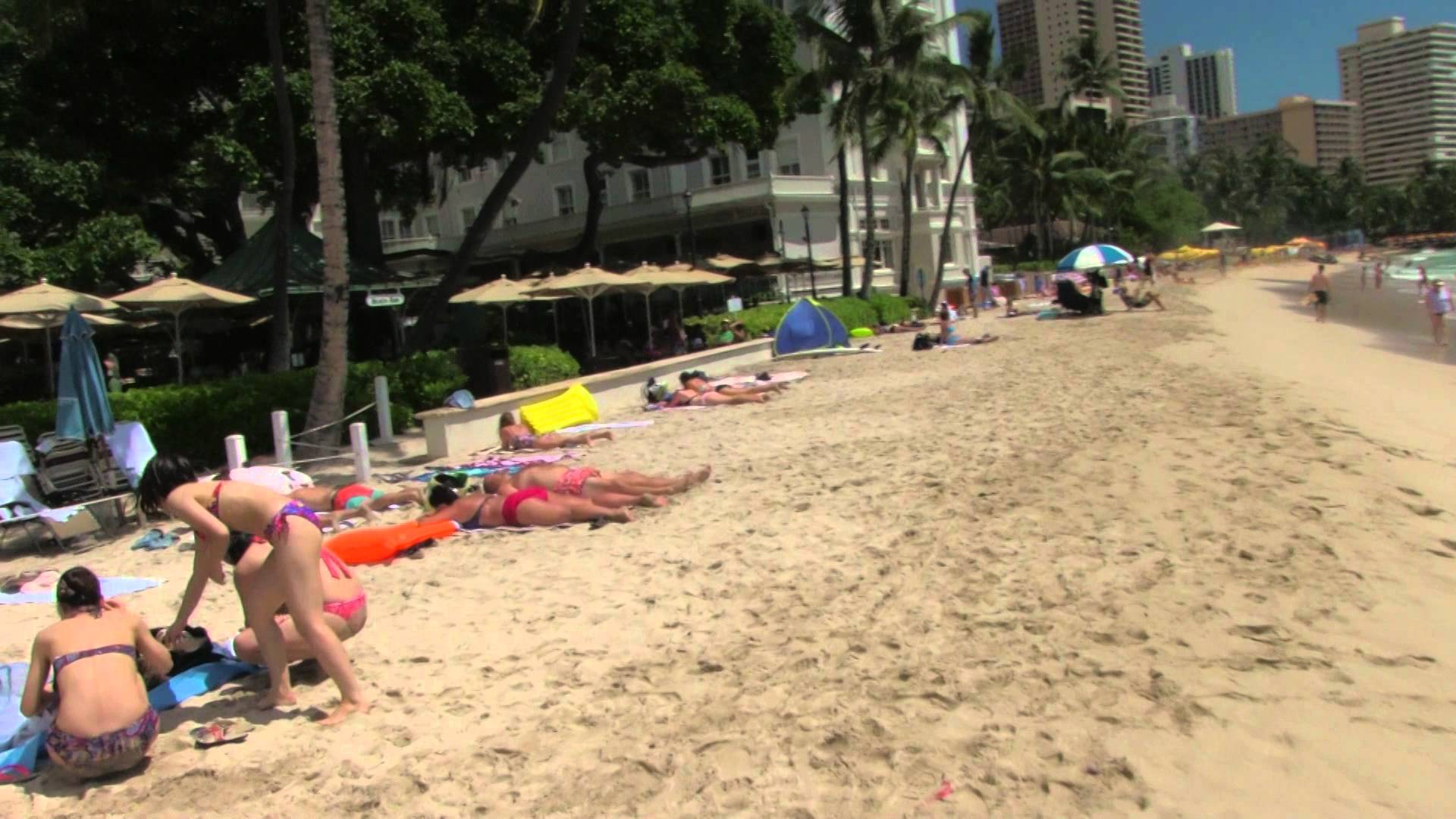 Tourists on the Beach of Waikiki Hawaii