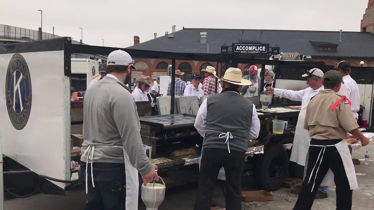 Flipping pancakes at the great pancake cookout Cheyenne frontier days