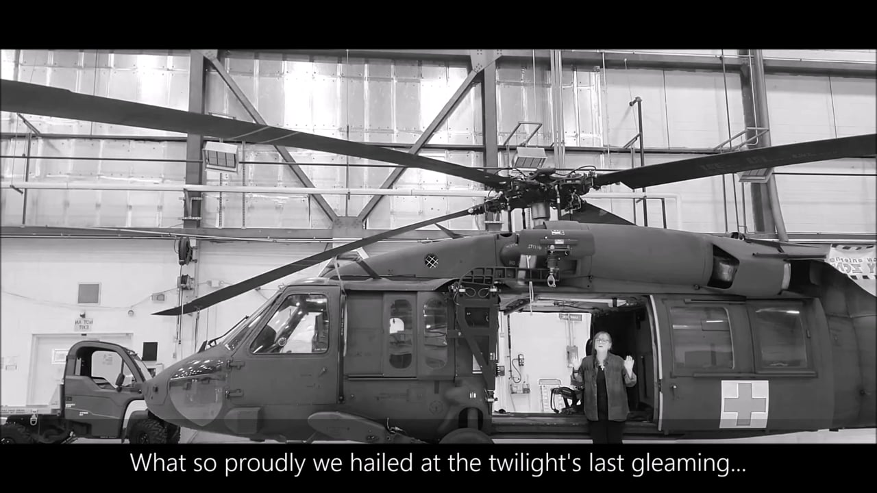 National Anthem Sung Like a Prayer by Army Wife alone in Army Hangar with Blackhawk