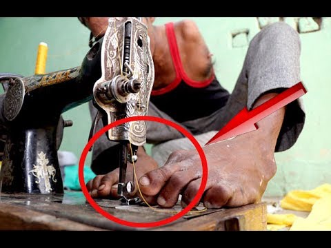 The talented man defies his disability, separates the clothes and stitches them with his toes..!