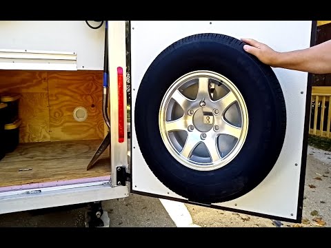 E41 Mounting Tire To Make More Storage – Cargo Trailer To Travel Trailer Conversion