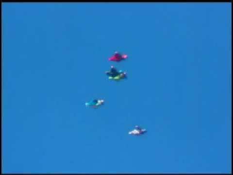 Wingsuit Flock of 7 Below-a-Blue-Canvas