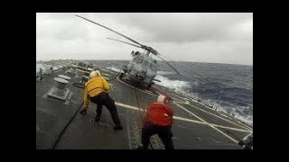 Watch This Crazy Video of helicopter landing on ship in rough sea