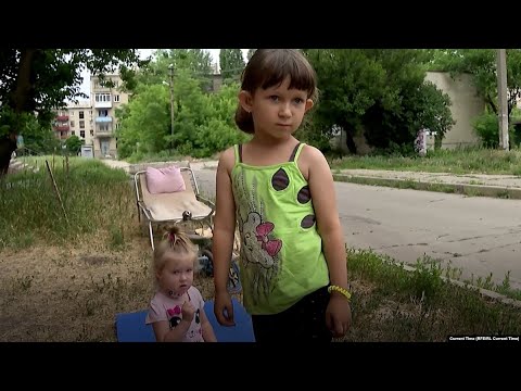 Last Road From Lysychansk: Thousands Urged To Evacuate Ukrainian City
