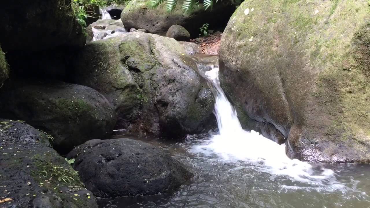 Relax at a small Hawaii waterfall