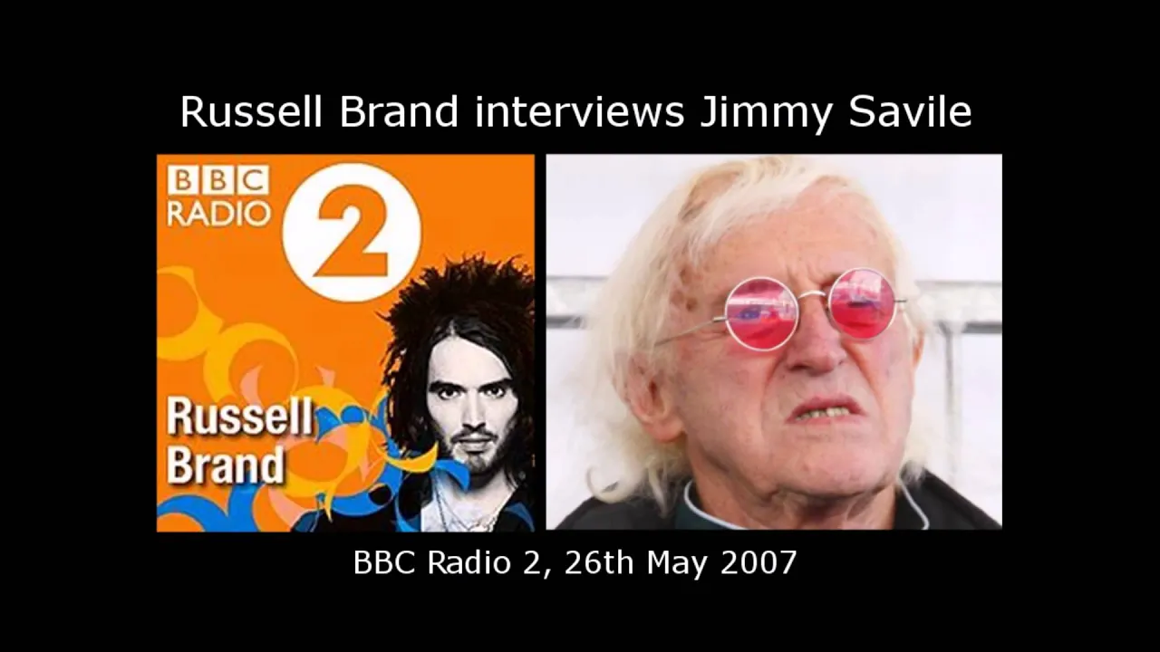 Russel Brand is very honored to interview Jimmy Saville, pimps his assistant to him
