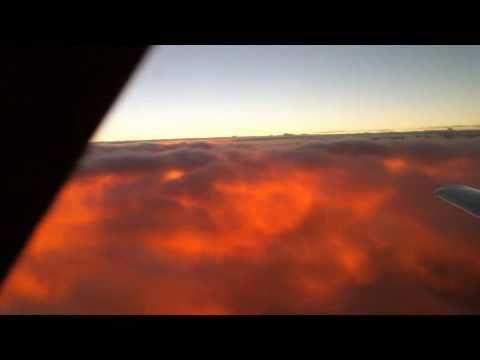 Sun rise under the clouds at FL280