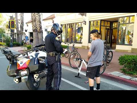 California Motorcycle Police Pulls Bicyclist Over And Ask For Drivers License Plus Gives Ticket