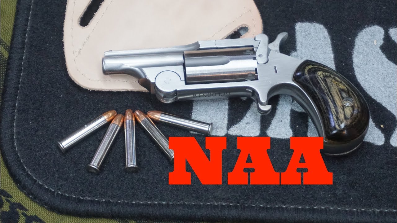 A pair of NAA mini 22 pistols, old & new
