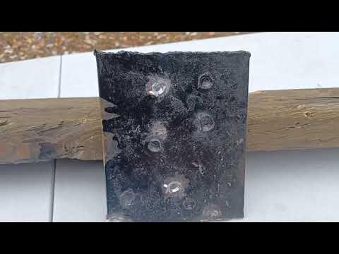 200 yds shooting 10.5 " AR-15 with Green Tips on Mild Steel