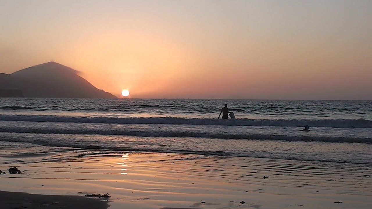 Closer View of Whole Sun Setting over Pacific Horizon on Beach, Baja, Punta Banda, Mexico (Surfing)