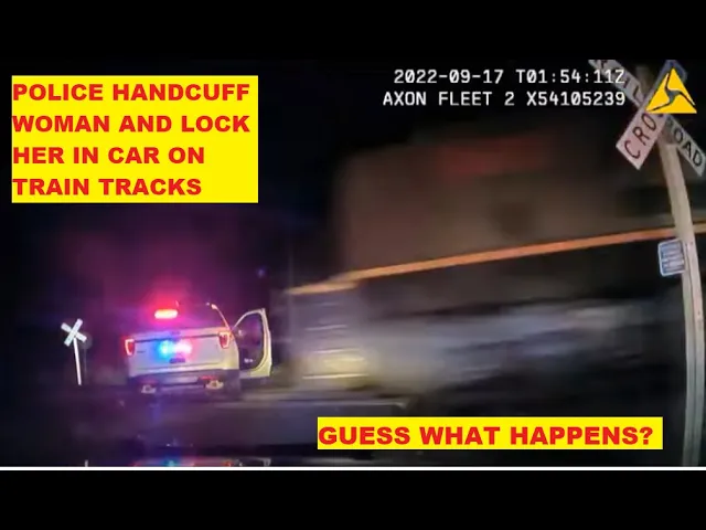 Fort Lupton Police Force Woman Into Police Car On Train Tracks - Train Comes Honks Horn Police Watch