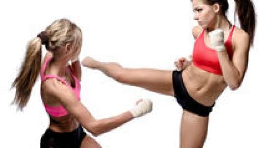 Cat Fight! 2 girls fight in a locker rm w/ a surprise ending.