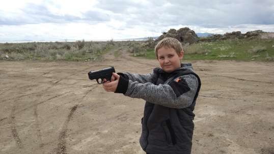 Kids with a glock 19 and shotgun