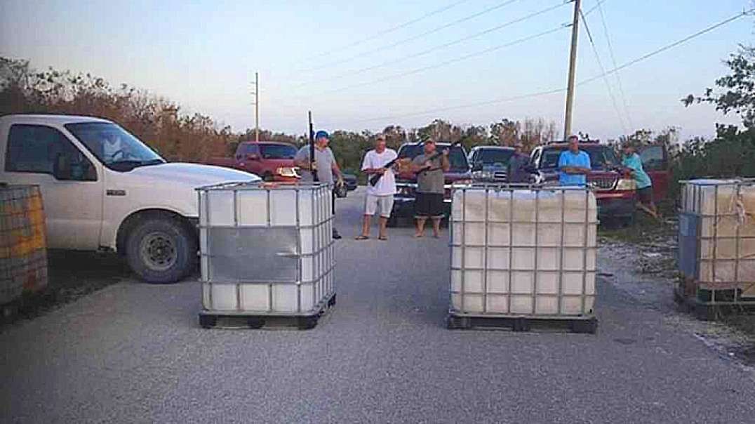 Bahama local militia blocking the road to stop pirates in Abaco