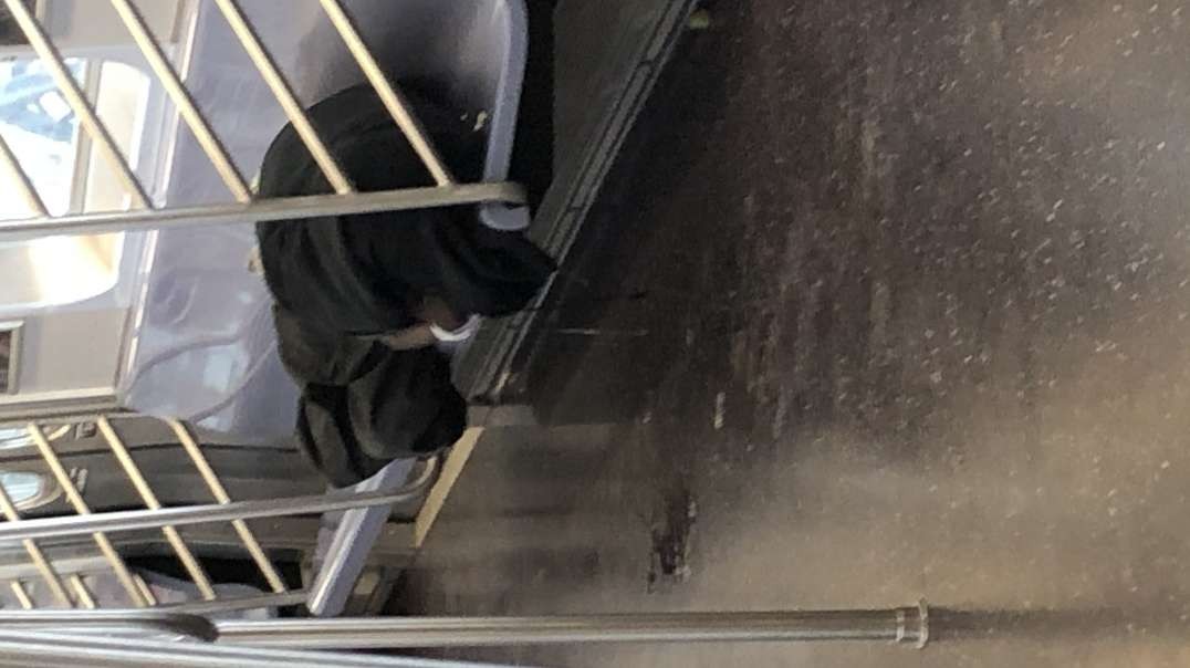 Homeless man sick on train during plandemic.