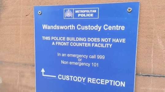 Wandsworth police station. Dr Schoning's release after 22 hrs since his arrest