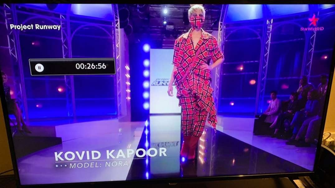 2019 fashion show eerily shows "Kovid" outfit includes mask