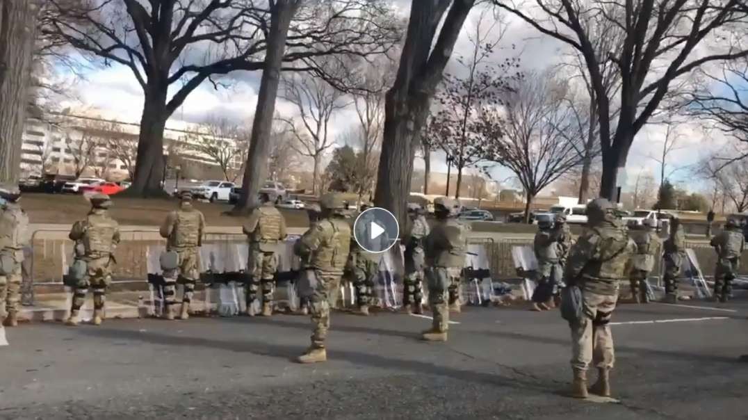 No salutes. National Guard turn backs on Biden motorcade