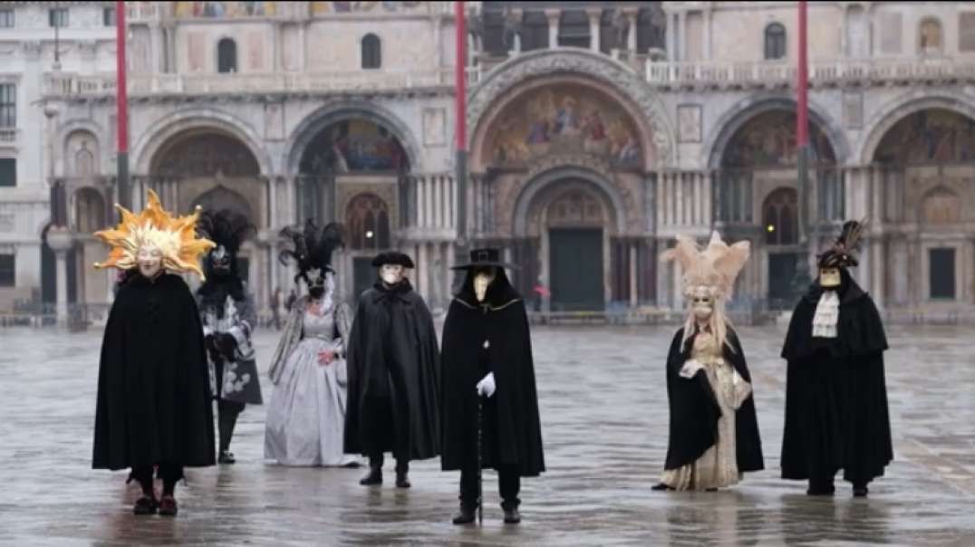 Revellers in masks celebrate carnival in St. Mark's Square despite cancellation