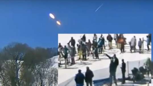 People pointed to the sky as two sun type objects appear on live feed