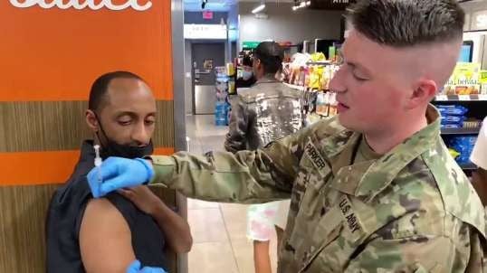 Watch: Uniformed Troops Go To Bars & 7-Eleven In Dallas To Randomly Vaccinate "Younger Crowd"