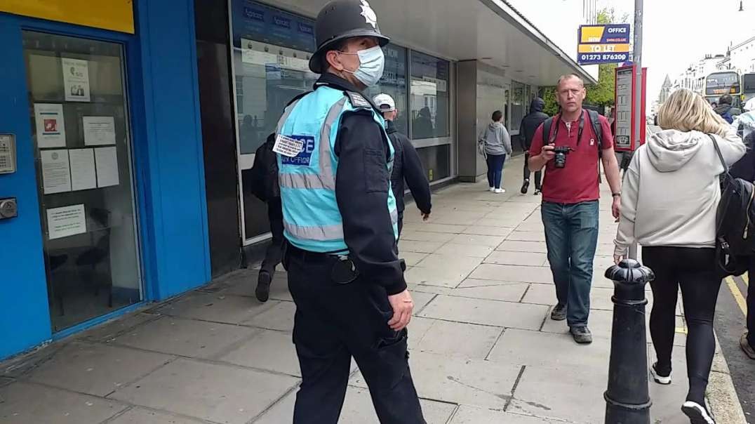 Policeman with sticker - Brighton Freedom March 08.05.21