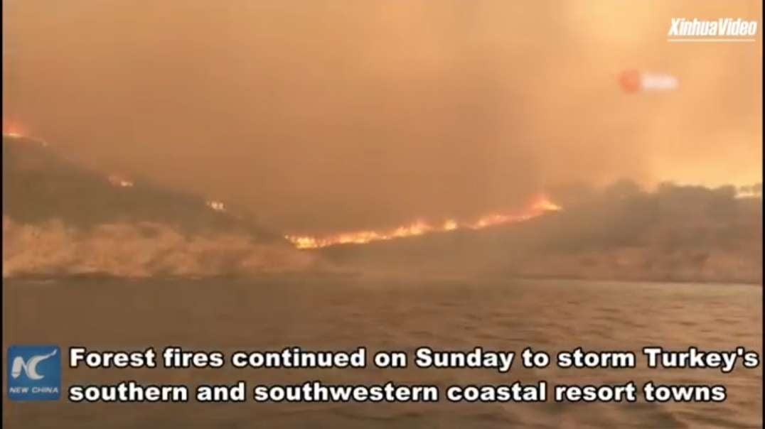 Wildfires storm Turkey's coastal resort towns, forcing evacuations.mp4