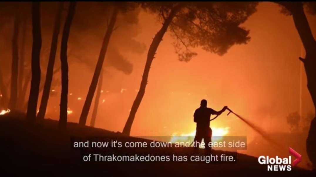 Greece residents flee as wildfires in Athens burn for 5th day.mp4