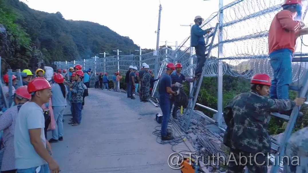 China building razor wall to 'prevent Vietnamese' from entering...more like to keep Chinese from leaving