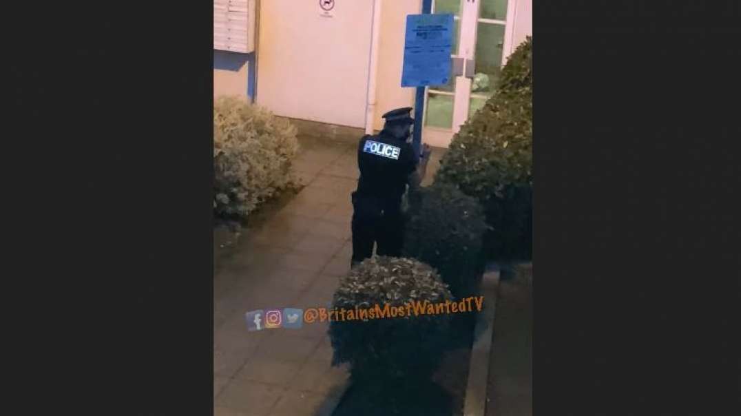 Police Officer Handcuffed to a Lamp Post in Brixton London