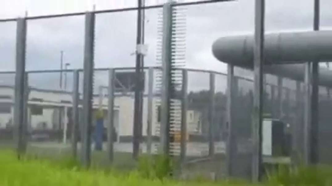 Wake up! high double electric fenced covid Quarantine camp near Brisbane airport. Covid camp.