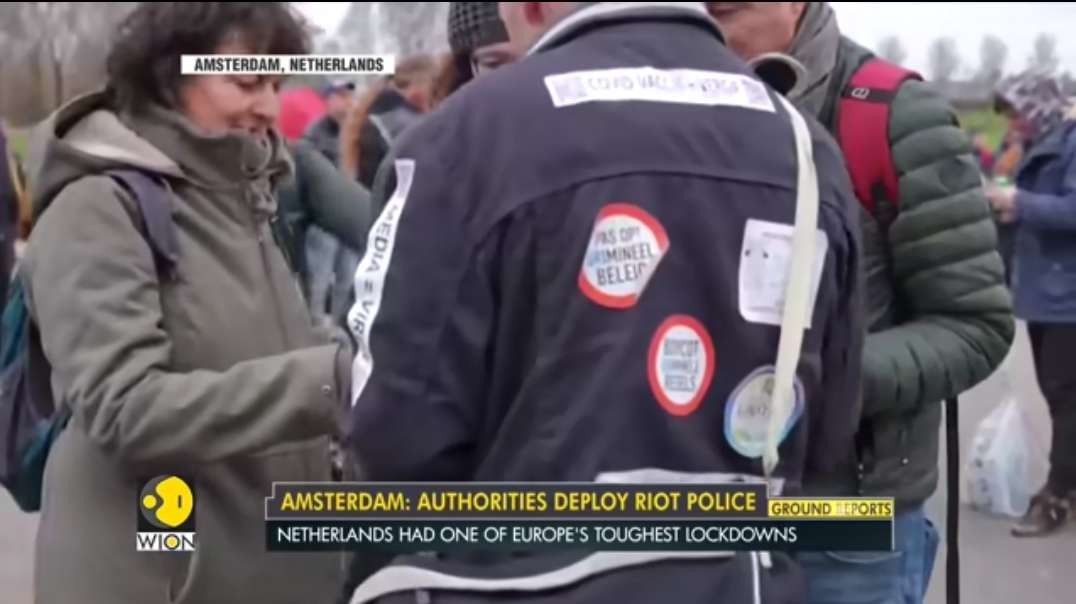 Netherlands- Thousands protest against Covid-19 curbs in Amsterdam _ Latest Engl.mp4