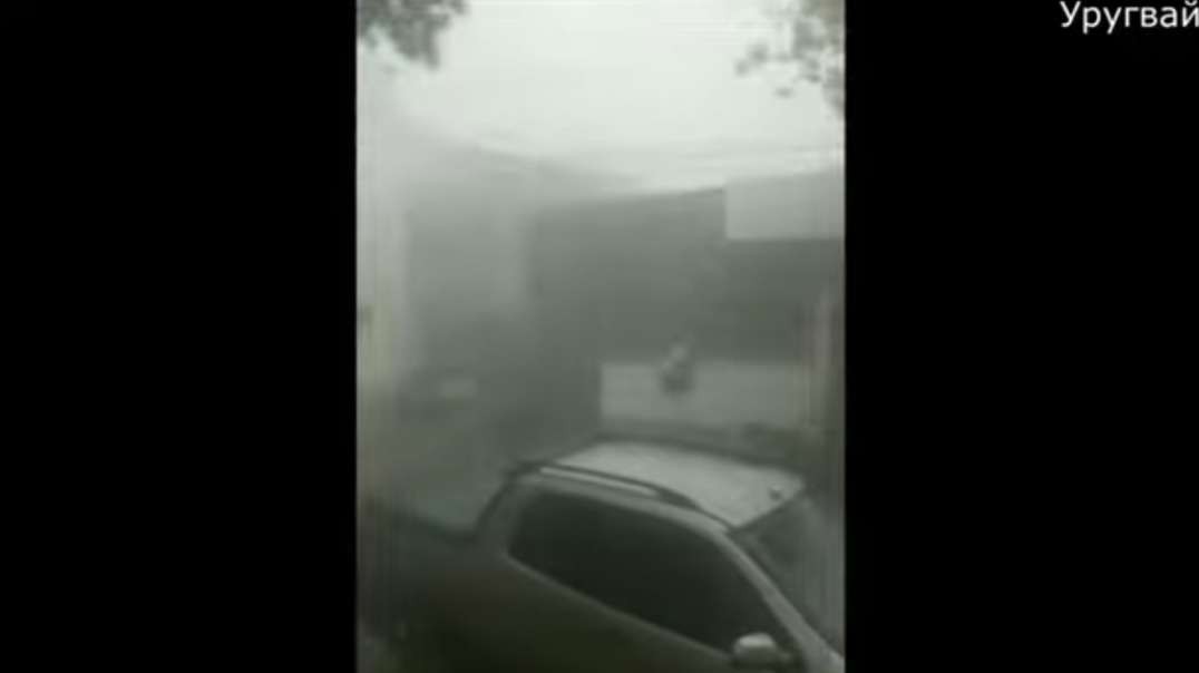 Flooding and storm in Uruguay on March 30. Streams of water wash away the city of Mercedes.. mp4