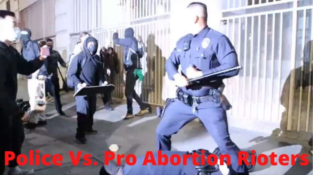 Cop Faces Off With Antifa Pro-Abortion Rioters