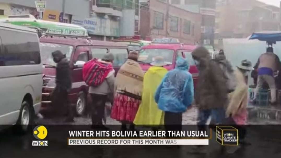Rare snowfall blankets part of Bolivia, locals protect themselves with plastic s.mp4