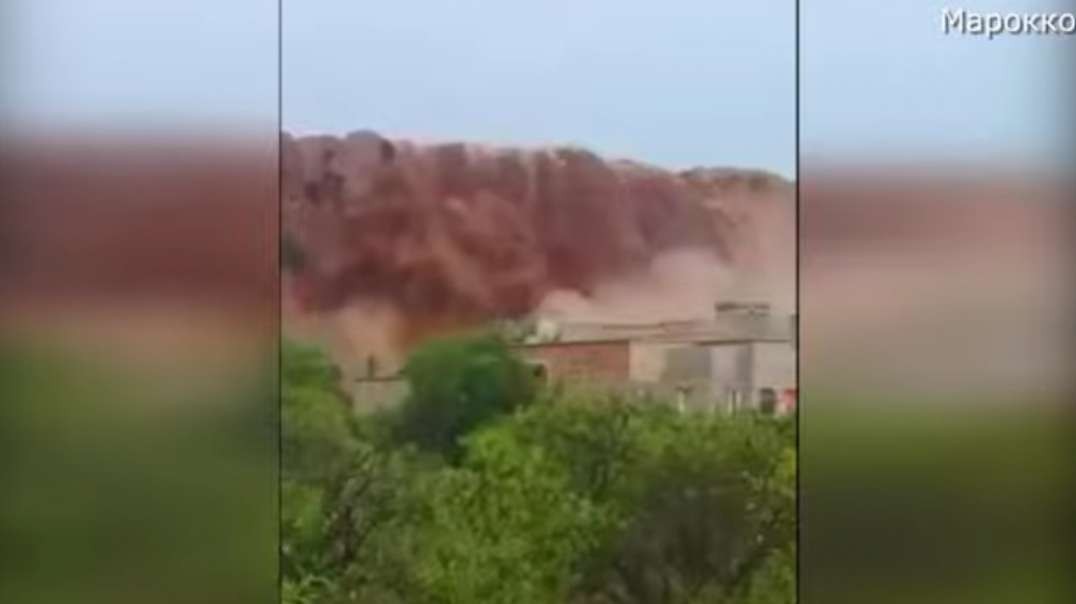 An eerie mudflow waterfall in Morocco 2022.mp4
