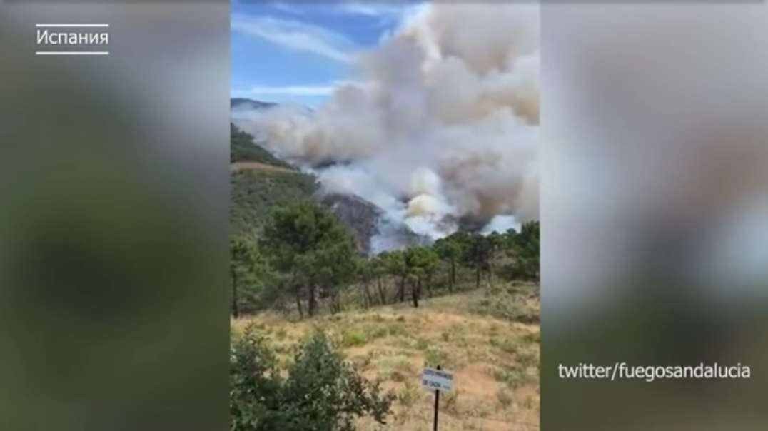 Европу уничтожает огнем. В Малаге как на вулкане- адский лесной пожар выжигает п.mp4
