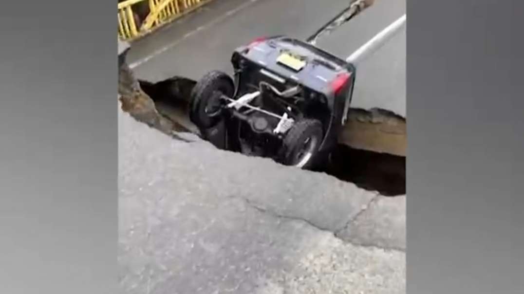 A collapsed bridge and road damage due to torrential rain and flooding Is that a collapsed tunnel?. mp4