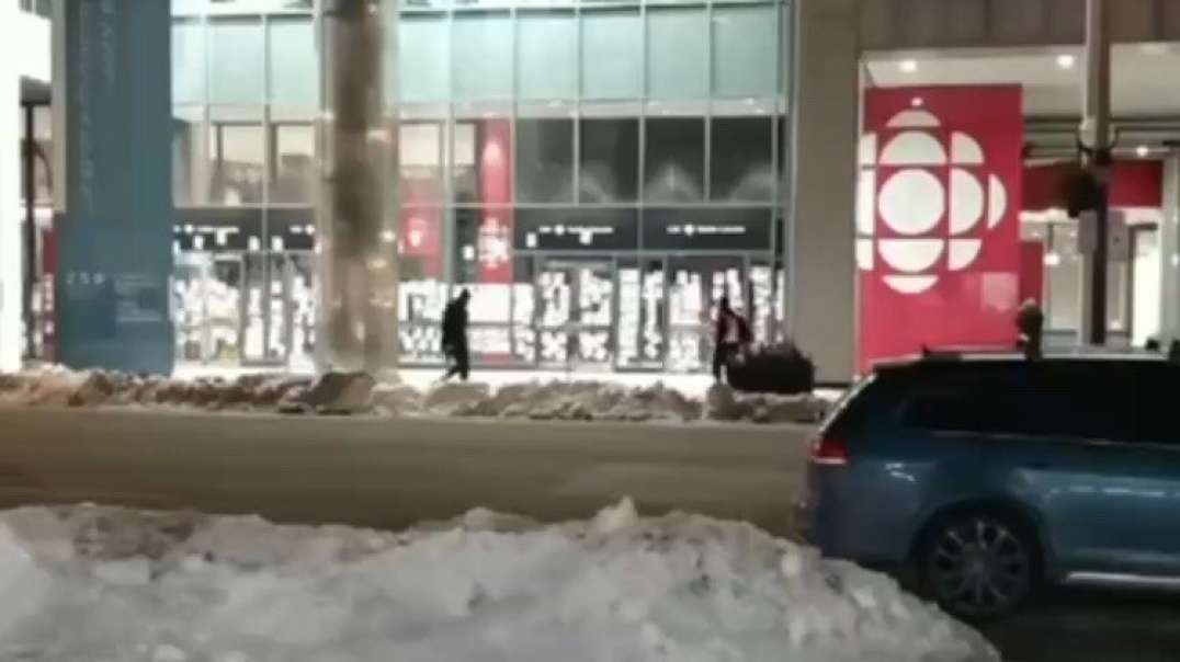 A video posted online shows the CBC building in Toronto overnight being plastered with posters of those believed to be injured by the Covid-19 vaccines