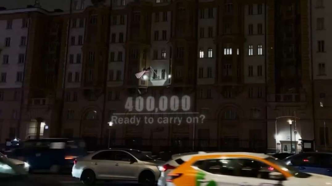 Activists light up US Embassy in Moscow, with current casualty count for Ukraine