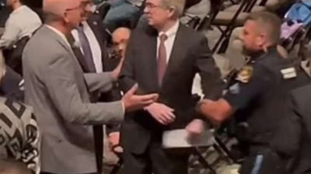 Peter Flaherty, Chairman of the National Legal and Policy Center (NLPC), had his microphone cut, was arrested and forcibly removed from the arena for speaking some very uncomfortable truths.