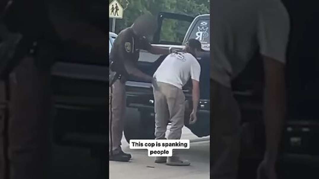 This cop is spanking people (Ryan Long)