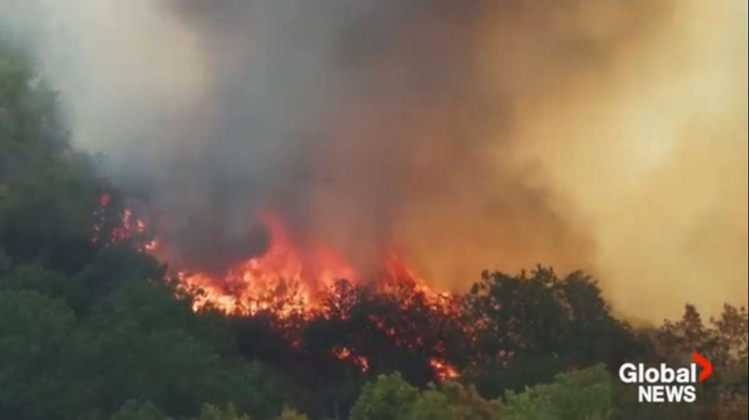 Greece wildfires Hundreds of people evacuated as fire spreads near Athens(360p).mp4
