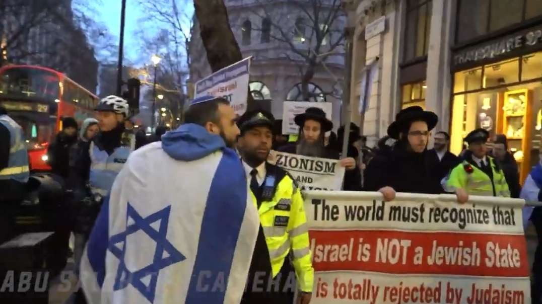 Israel Gaza War Zionists get mad at Neturei Karta Jews in London Trafalgar Square 1-14-24 counter-protest.mp4