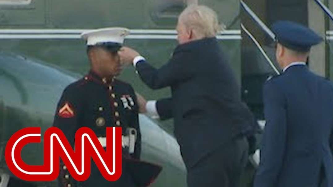 President Donald Trump Stops to Retrieve Marine's Hat While boarding Marine One