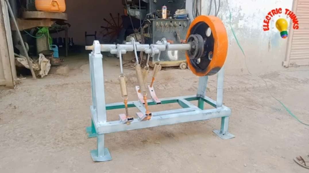 How to make Fly wheel free energy spring machine / make electricity generator using spring