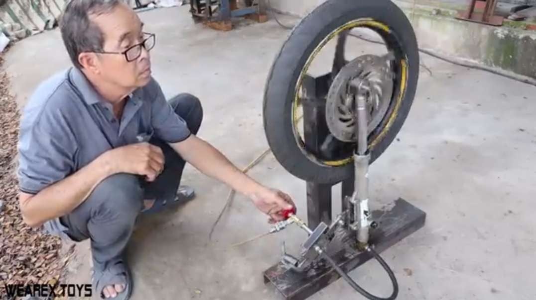 Making a Compressed Air Engine from Motorcycle Wheel and Fork.mp4