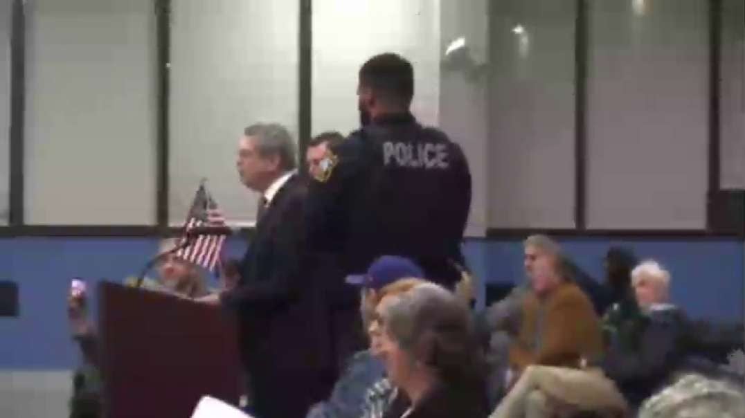 New Jersey - American Flag banned, police remove man holding it